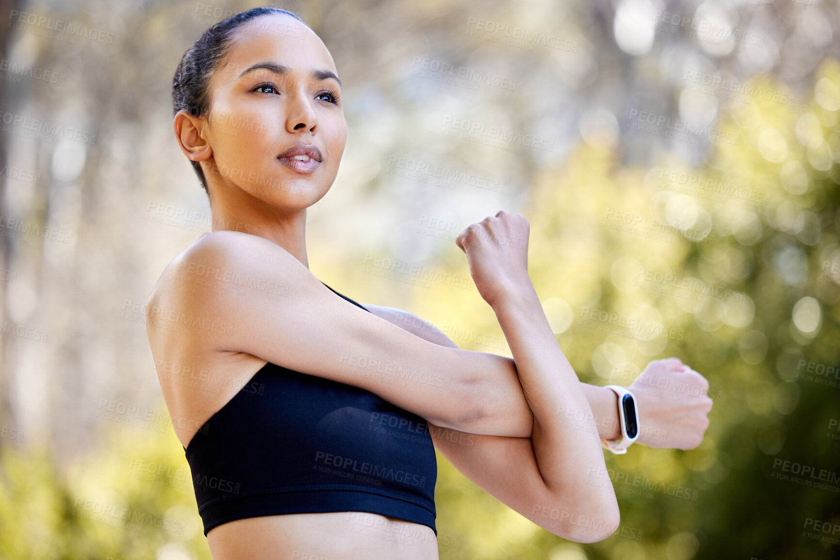 Buy stock photo Fitness, woman and stretching arms for workout, exercise or healthy cardio in the nature outdoors. Fit, active and sporty female person, athlete or runner in warm up arm stretch for training or run