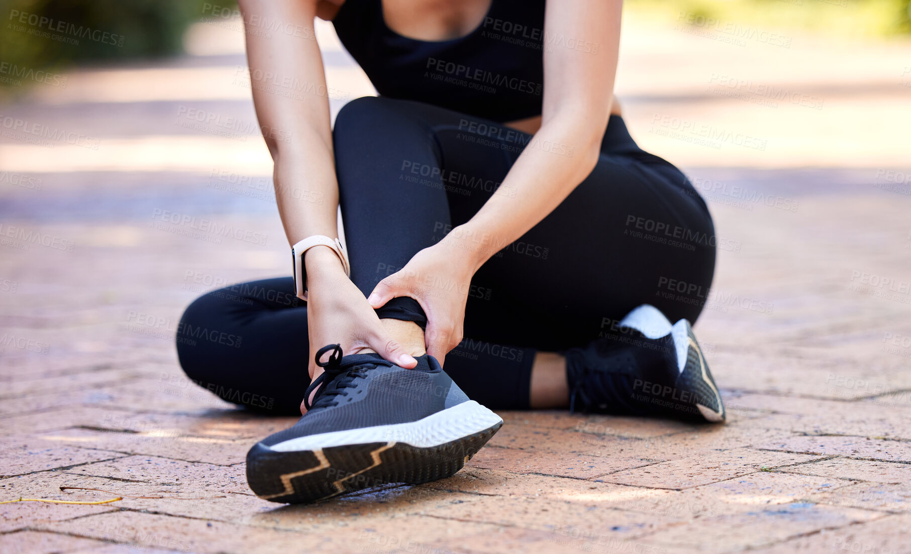 Buy stock photo Woman with ankle pain, running injury and fitness with joint fracture, muscle inflammation and health problem. Female athlete injured on run outdoor, hands holding sore foot and healthcare emergency