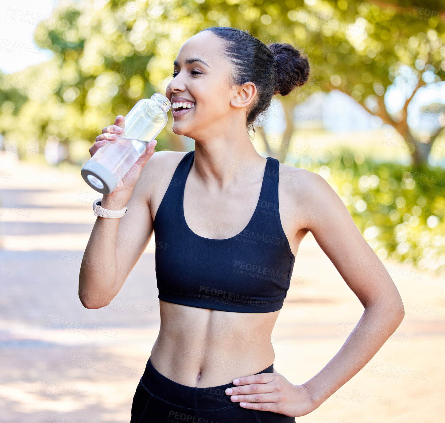 Buy stock photo Happy woman, fitness and laughing with water bottle in rest from fun running, exercise or cardio workout in park. Fit, active or thirsty female person, athlete or runner with smile for sustainability