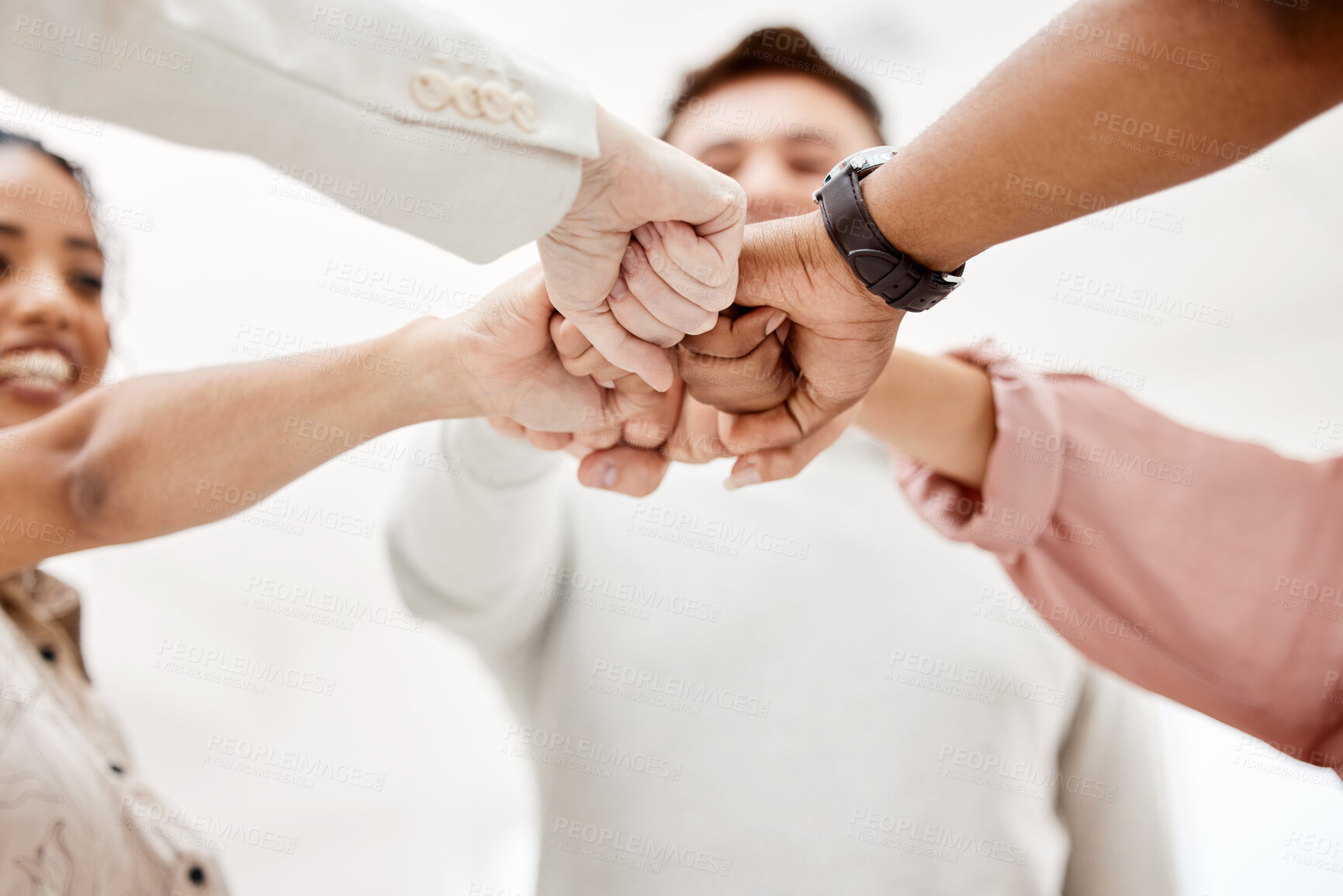 Buy stock photo Fist bump, support and group of people for teamwork, challenge and collaboration, team building game or startup goals. Woman in circle with strong, cooperation and integration hands sign for power