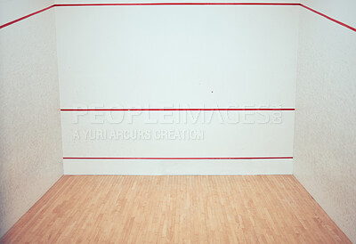 Buy stock photo Empty squash court in a sports centre. Three walled court with nobody and copyspace in a training and practice club. Red line markings on a wall with a wooden timber floor in a sporty arena and room