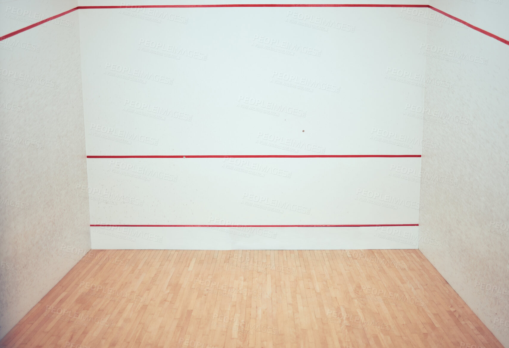Buy stock photo Empty squash court in a sports centre. Three walled court with nobody and copyspace in a training and practice club. Red line markings on a wall with a wooden timber floor in a sporty arena and room