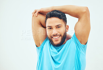 Buy stock photo Portrait of squash player stretching and smiling before playing a court game with copyspace. Happy fit active hispanic athlete standing alone and getting ready for training practice in sports centre