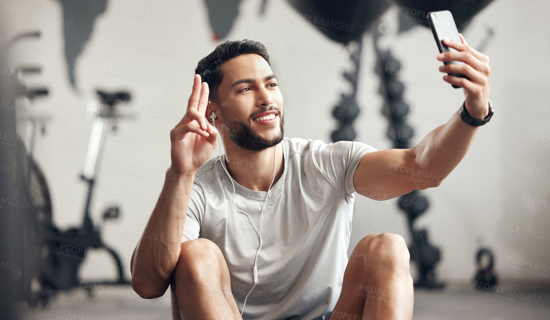 Buy stock photo Man, gym and selfie with happiness for exercise with motivation and wellness with peace sign. Male person, training and video call for a workout for sports and conversation with smile at a club.