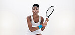 Focused tennis player ready for a match. Young woman waiting to play a game of tennis. African american girl holding her tennis racket in a match. Fit, athlete playing a game of tennis