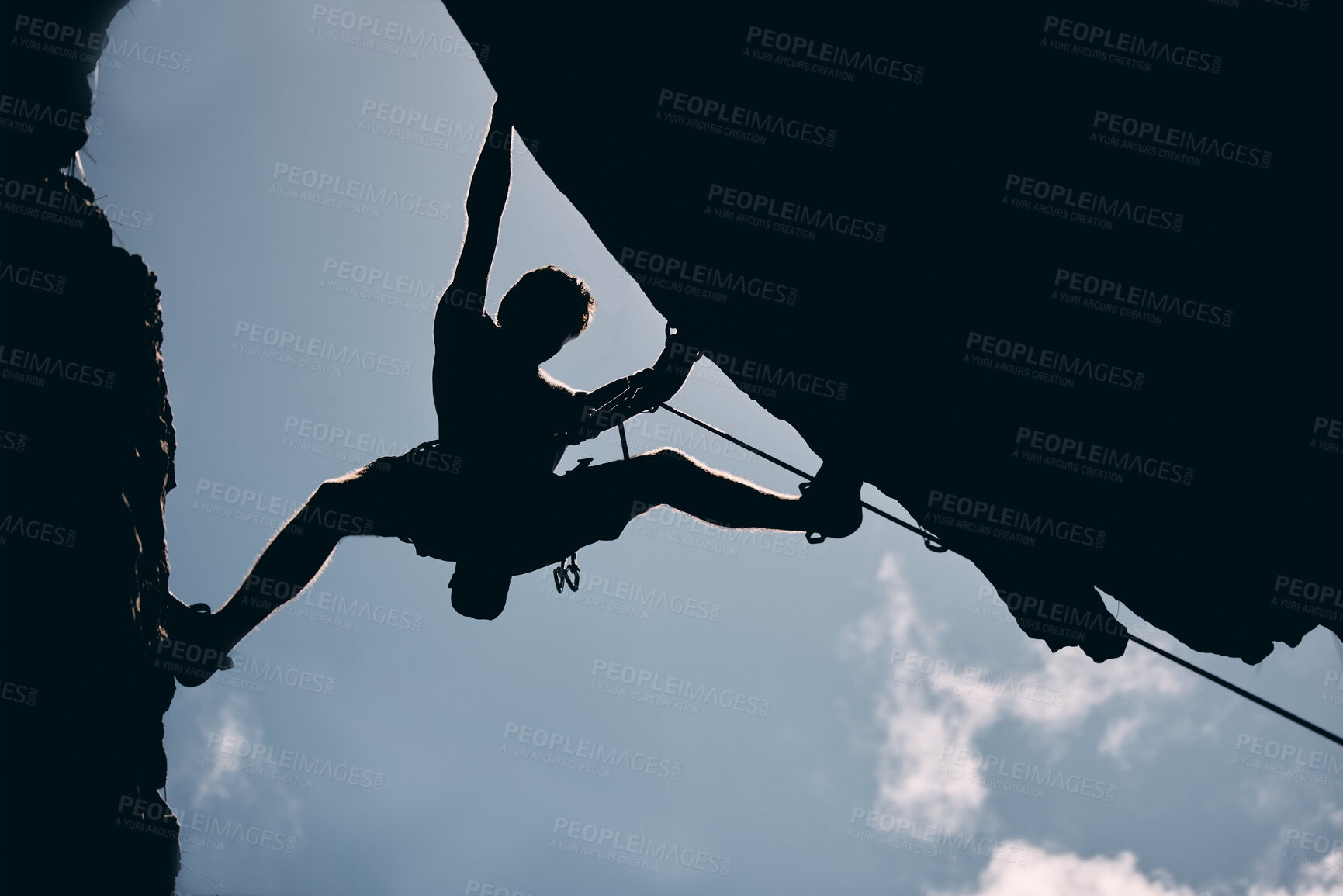 Buy stock photo Hiking, silhouette or man climbing a mountain, rock or stone with equipment for fun, adventure or exercise. Trekking, climb or training outside, countryside or nature with male recreation activity