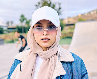 Buy stock photo Portrait, fashion or sunglasses with an arab woman outdoor in a cap and scarf for contemporary style. Islam, faith and hijab with a trendy young muslim female person posing outside in modern eyewear