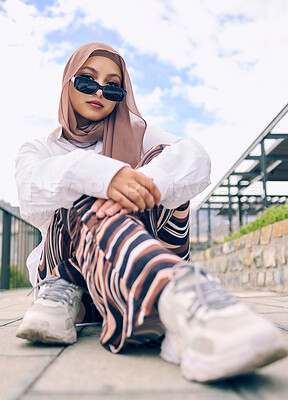 Buy stock photo Portrait, fashion or hijab with an islam woman outdoor in sunglasses and scarf for contemporary style. Arab, faith or burka with a trendy young muslim person outside in a city wearing modern clothes