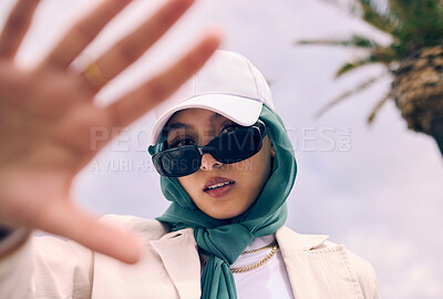 Buy stock photo Muslim woman, fashion selfie and portrait in city, street and gen z aesthetic for beauty, blog and post. Young islamic girl, student and influencer with sunglasses, social media and travel in Dubai