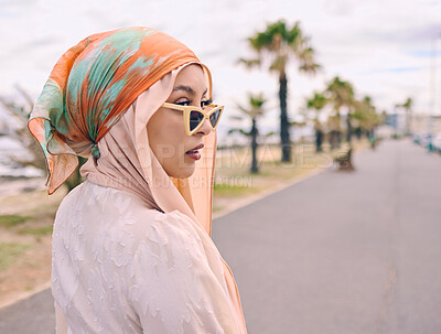 Buy stock photo Fashion, sunglasses and Muslim woman in city with style, trendy clothes and casual outfit in Saudi Arabia. Religion, hijab and Islamic person with confidence, pride and cosmetics on summer weekend
