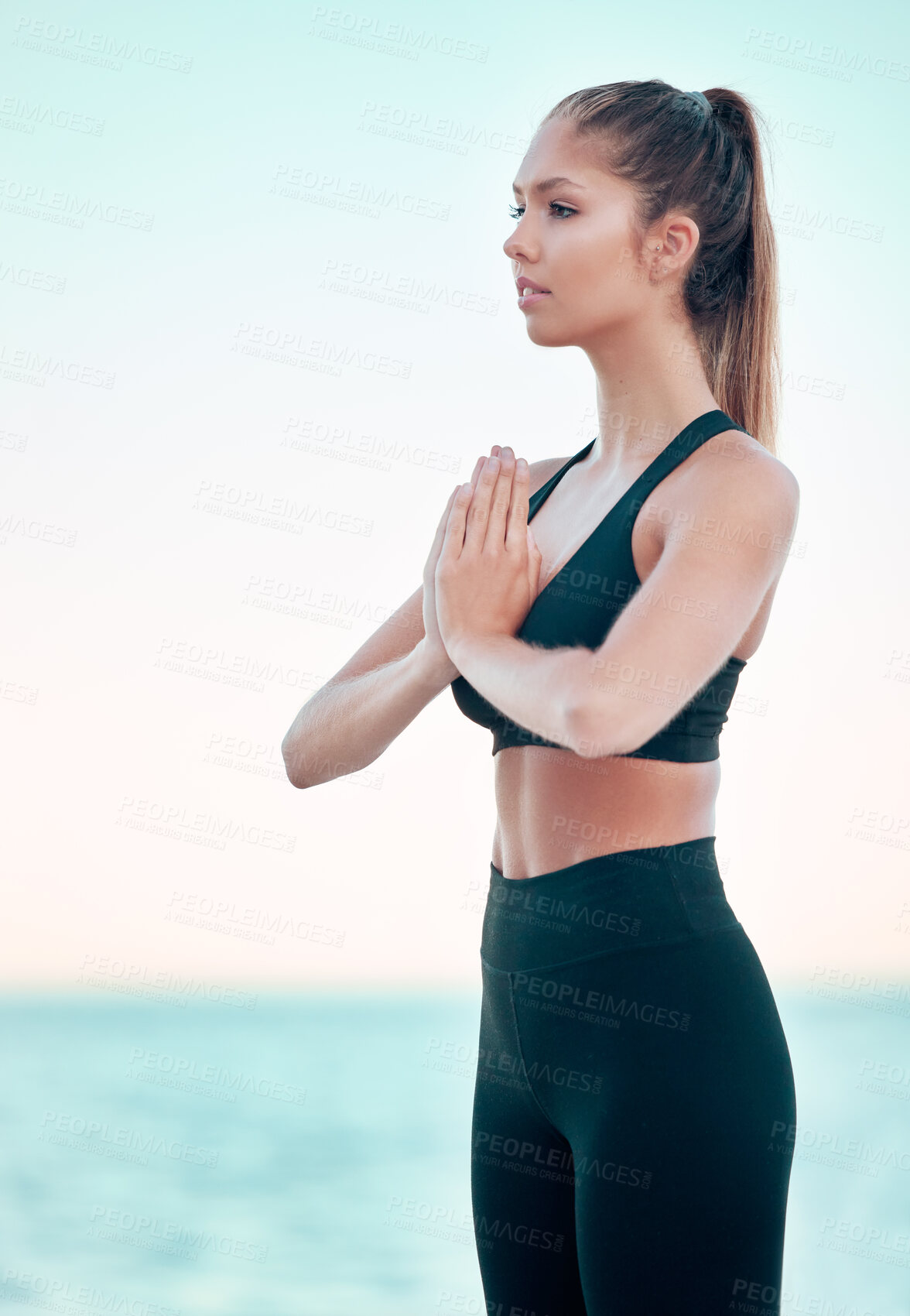 Buy stock photo Yoga, namaste and woman at beach, meditation by the ocean with mindfulness, zen with balance and exercise. Female yogi with health, wellness and peace, hands in prayer outdoor and spiritual faith
