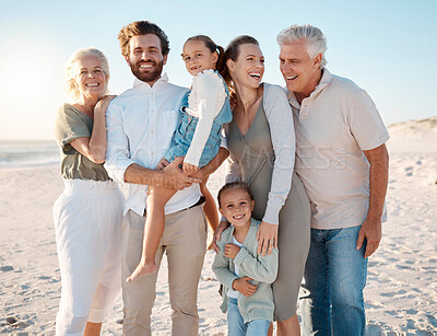 Buy stock photo Love, portrait of happy family and on the beach together happy with a lens flare. Summer vacation or holiday break, happiness or excited, smiling people standing on sand by the ocean with blue sky