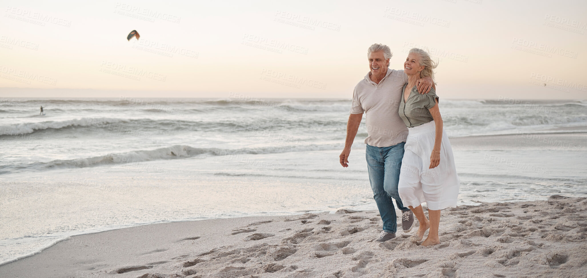 Buy stock photo Love, married couple walking and on the beach happy together with sunset. Summer vacation or holiday break, happiness or romantic date and retirement elderly people walk on sand by the ocean 