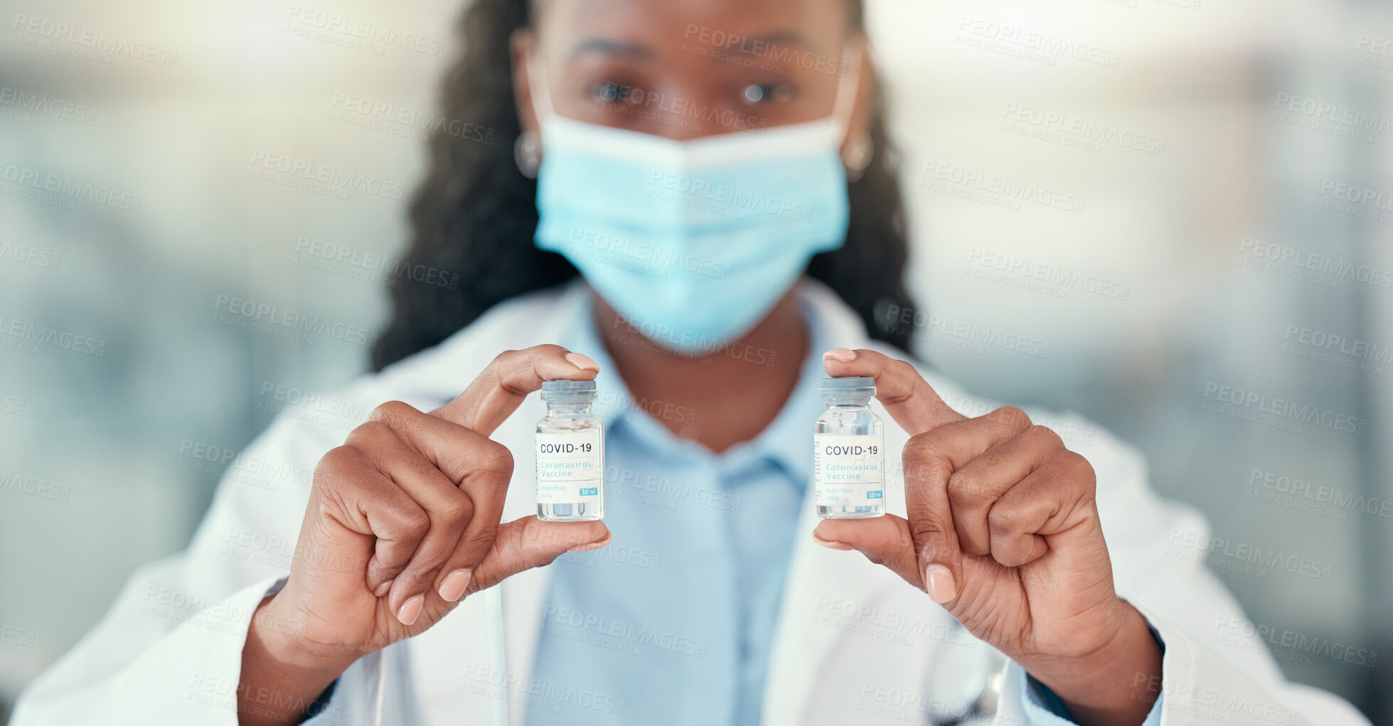 Buy stock photo Covid 19, doctor hands and black woman with vaccine vial for virus or corona. Bottle, medical professional or portrait of person with vaccination mask, medicine or pharmaceutical drugs for healthcare