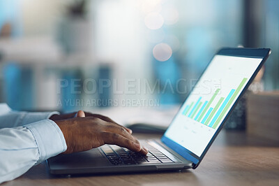 Buy stock photo Closeup hands of african man working on a laptop. African american business man using a computer while working late at night in his office. Putting in overtime after hours to ensure success and growth