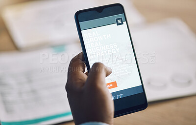 Buy stock photo Phone, research and strategy with a business man at a desk in his office for work while planning growth. Hand, mobile and internet with a male employee reading information or data online closeup