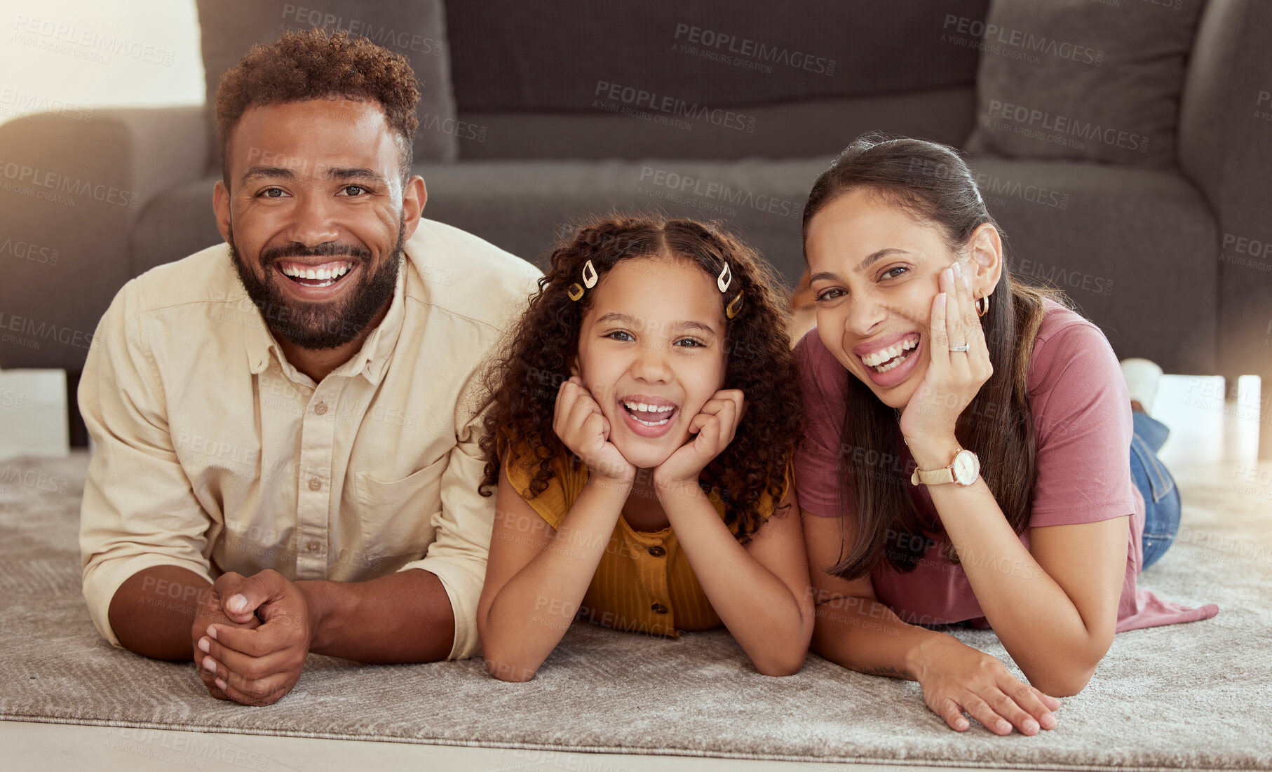 Buy stock photo Family home, portrait and youth with mom, dad and young girl together with fun. Living room, mother and father with a child by sofa with love, bonding and parent support with a smile in lounge