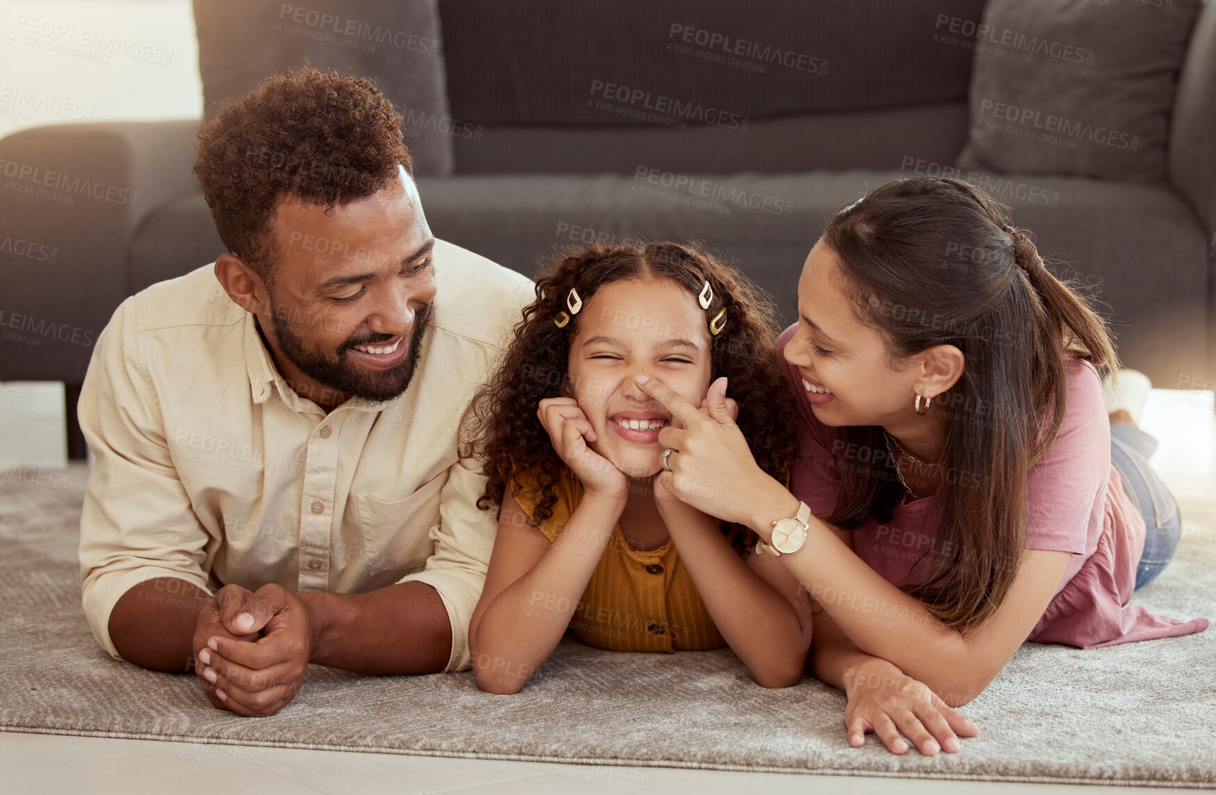 Buy stock photo Family home, playing and kid with mom care, dad and young girl together with fun. Living room, mother and father with a child by sofa with love, bonding and parent support with a smile in lounge