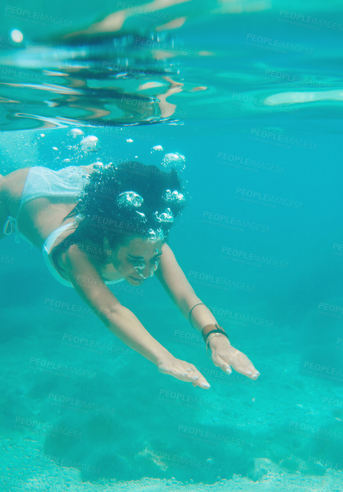 Buy stock photo Woman, swimming and adventure in bikini underwater for ocean fun, nature explore on summer vacation. Female person, island and discover journey on holiday for travel,  exotic diving on paradise trip