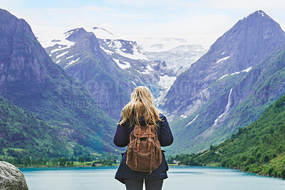 Buy stock photo Adventure backpacking woman enjoying view of majestic mountain lake explore travel discover beautiful earth