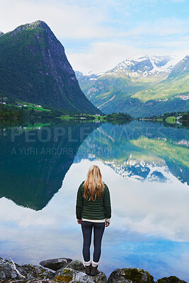 Buy stock photo Adventure woman enjoying view of majestic mountain lake explore travel discover beautiful earth