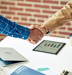 business people shaking hands in office meeting after successful partnership deal for startup company