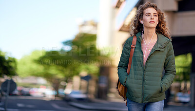 Buy stock photo beautiful woman walking in city street listening to music wearing earphones urban lifestyle