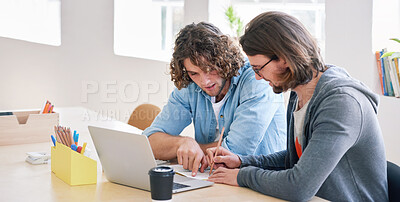 Buy stock photo College students working together two young men brainstorming ideas for project sitting at desk using laptop computer in class