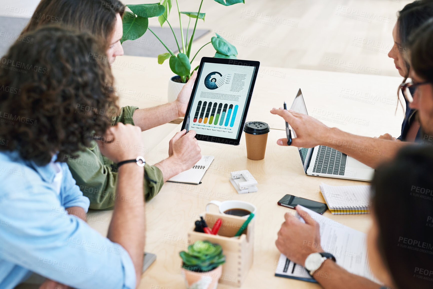 Buy stock photo Business people using digital tablet computer discussing financial graph data on mobile touchscreen device in meeting