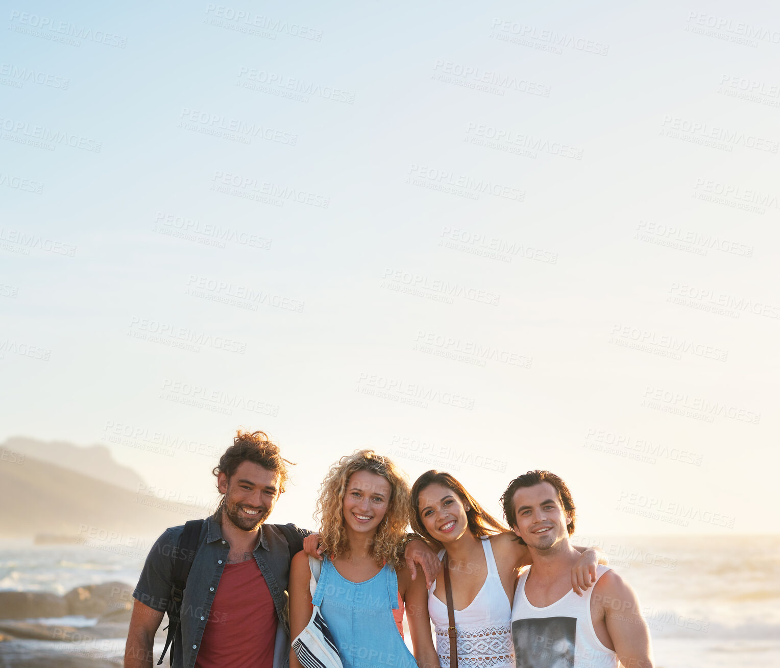 Buy stock photo group of friends posing on beach having fun summer vacation lifestyle on seaside at sunset