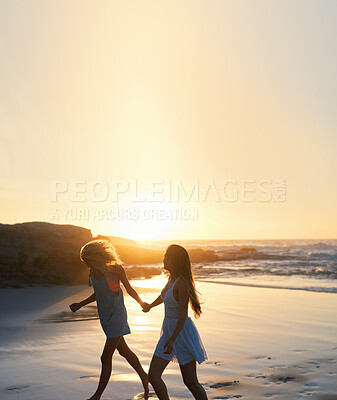 Buy stock photo woman friends running on beach at sunset holding hands having fun summer vacation enjoying freedom