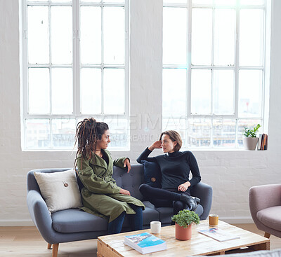 Buy stock photo Creative women on sofa talking, having conversation or being social in living room or fashion office space. Creativity, empowerment and diversity people having discussion for business collaboration