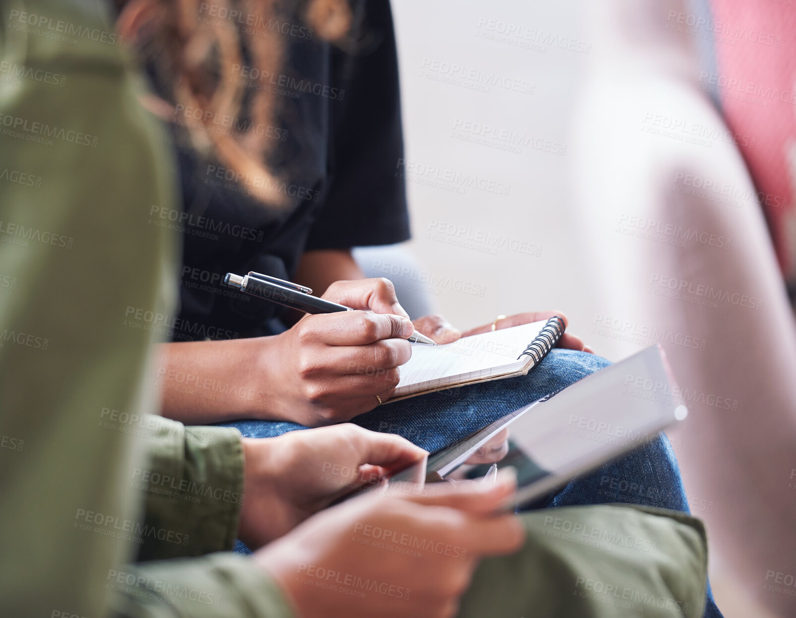 Buy stock photo African american woman writing notes with friend showing ideas on digital tablet computer students brainstorming