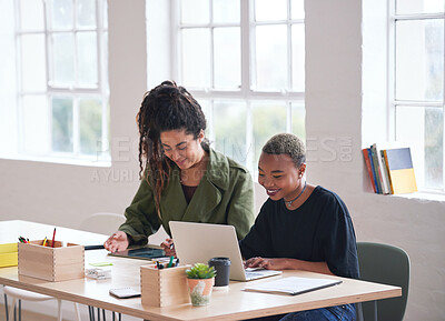 Buy stock photo College students working together two young women friends brainstorming ideas for project sitting at desk using laptop computer in class