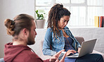 Young woman with dreadlocks using laptop computer browsing internet female student working on project sitting in internet cafe