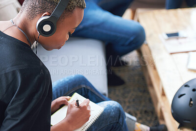 Buy stock photo Writing, notebook or black woman or student with planning, learning and listening to music, podcast or radio in class. Studying, research and creative girl with book for university, college or school