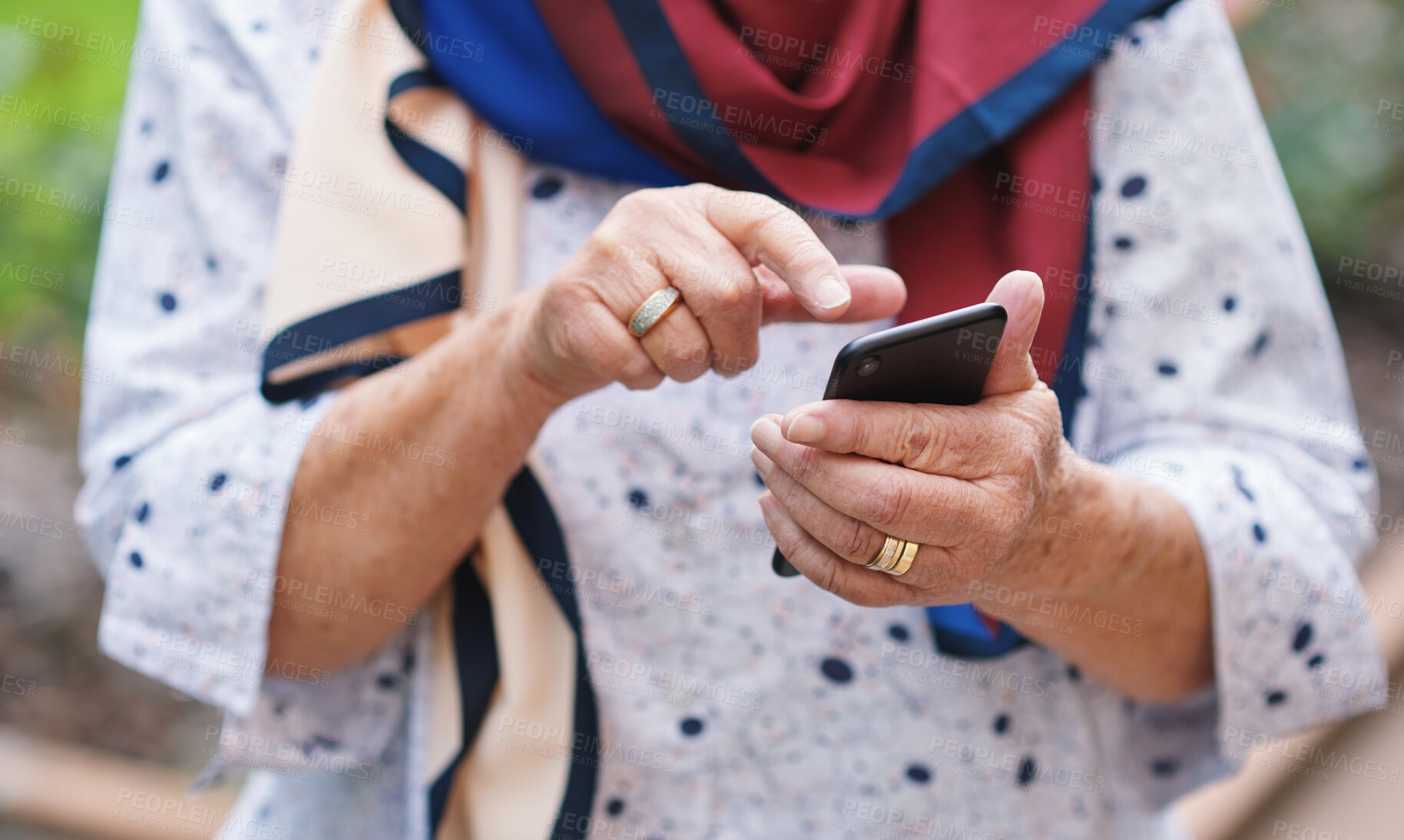 Buy stock photo Senior woman, hands and smartphone for communication, outdoors and online conversation in garden. Elderly person, social media and mobile app or internet connection, scrolling and browsing on tech