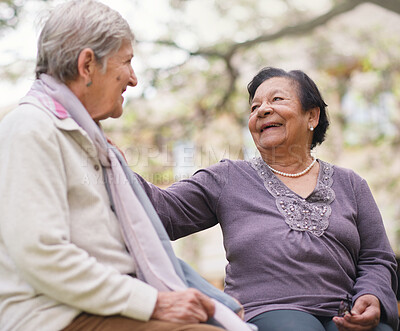 Buy stock photo Senior women, friends and conversation in outdoors, smile and bonding in retirement at park. Happy elderly people, love and connection or laughing for funny joke, communication and humor or speaking