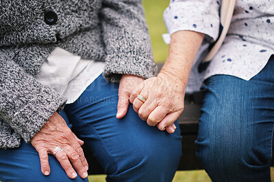 Buy stock photo Old people, hand holding and friends for love comfort in grief loss discussion, hope chat or trust. Retired person, fingers and closeup for connection in park for solidarity help, compassion or care