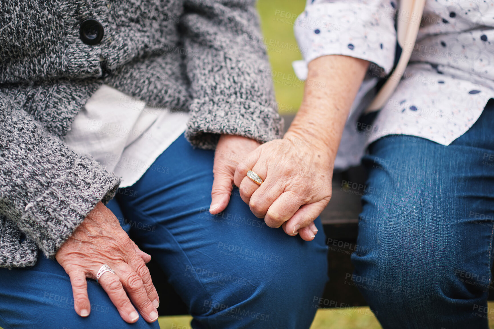 Buy stock photo Old people, hand holding and friends for love comfort in grief loss discussion, hope chat or trust. Retired person, fingers and closeup for connection in park for solidarity help, compassion or care