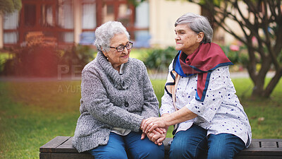 Buy stock photo Portrait, park and old women with retirement, holding hands and comfort with empathy, bonding together and weekend break. Face, elderly people and friends with support, fresh air and care with peace