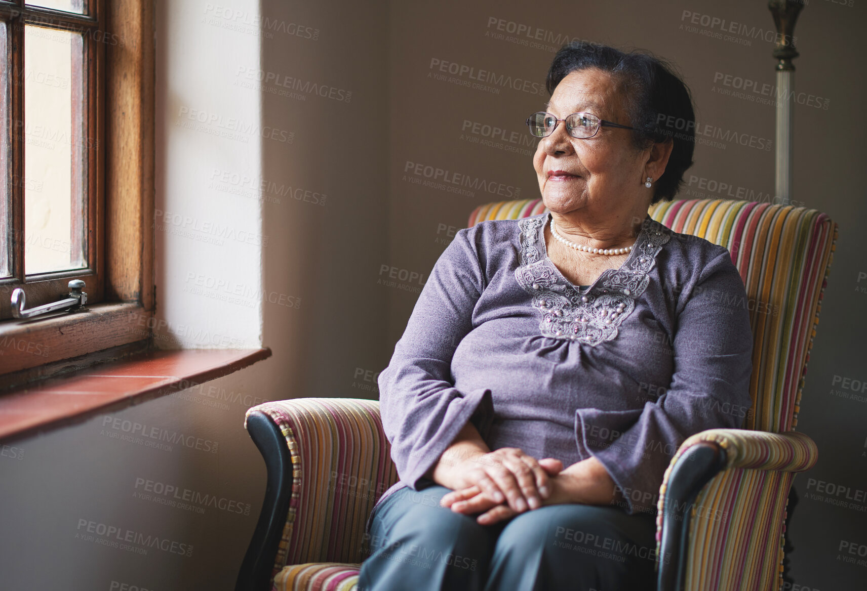 Buy stock photo Window, thinking and elderly woman in retirement, reflection and remembering past life. Senior person, planning and contemplating future or memory, nostalgia and wellness in nursing home or dreaming