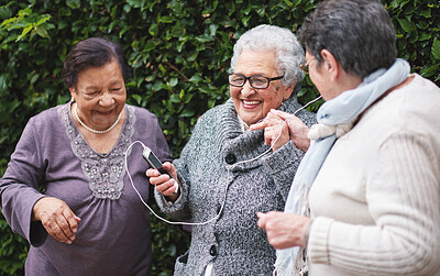 Buy stock photo Outdoor, friends and smartphone with senior women, smile and bonding together with retirement, park and sound. Old ladies, outside and mature people with cellphone, group or joy with weekend break