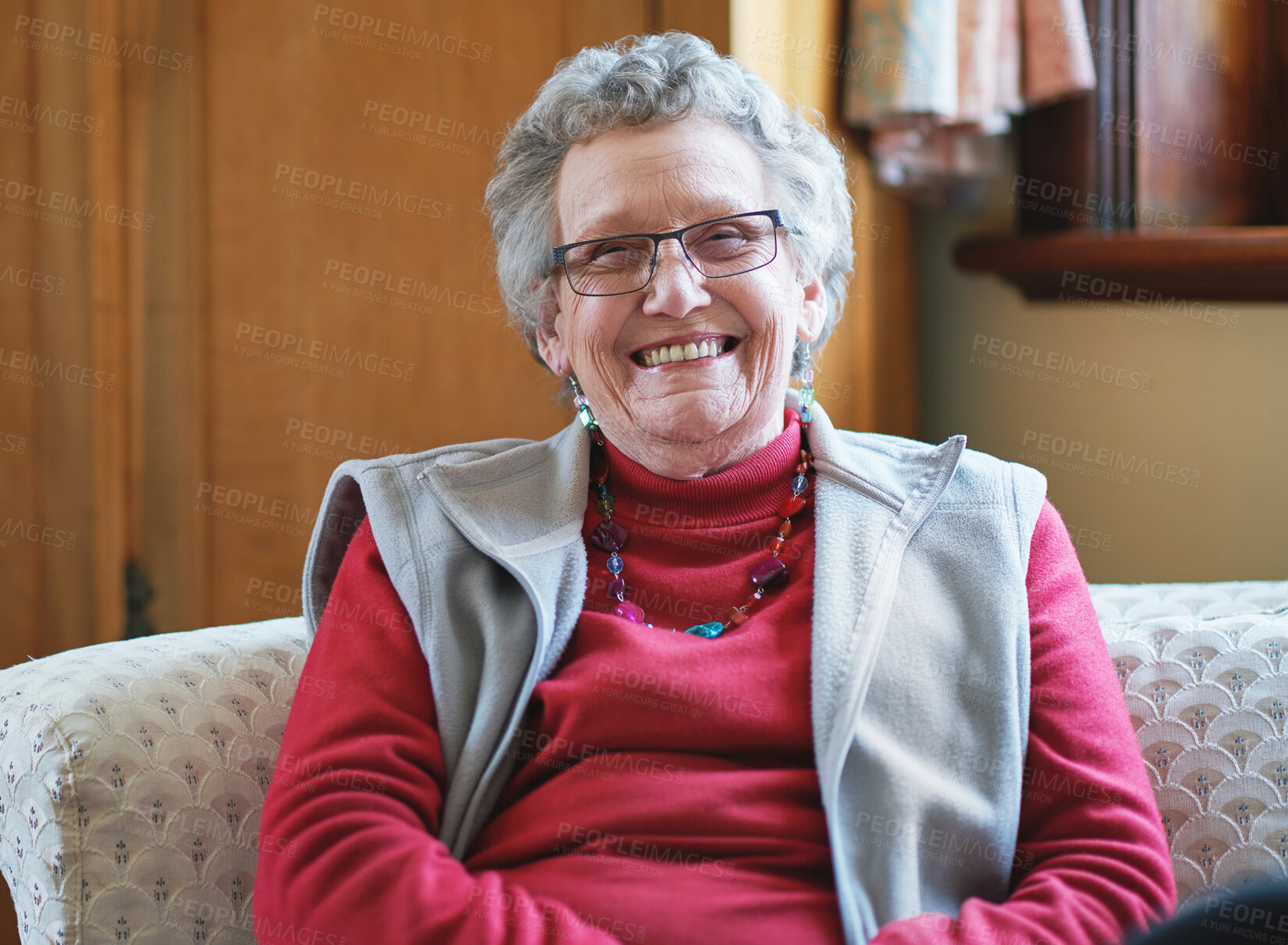 Buy stock photo Happy, glasses and portrait of senior woman sitting on sofa in the living room of retirement home. Smile, confident and headshot of elderly female person from Canada with positive attitude at house.