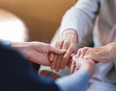 Buy stock photo Nurse helping old woman holding hands in retirement home