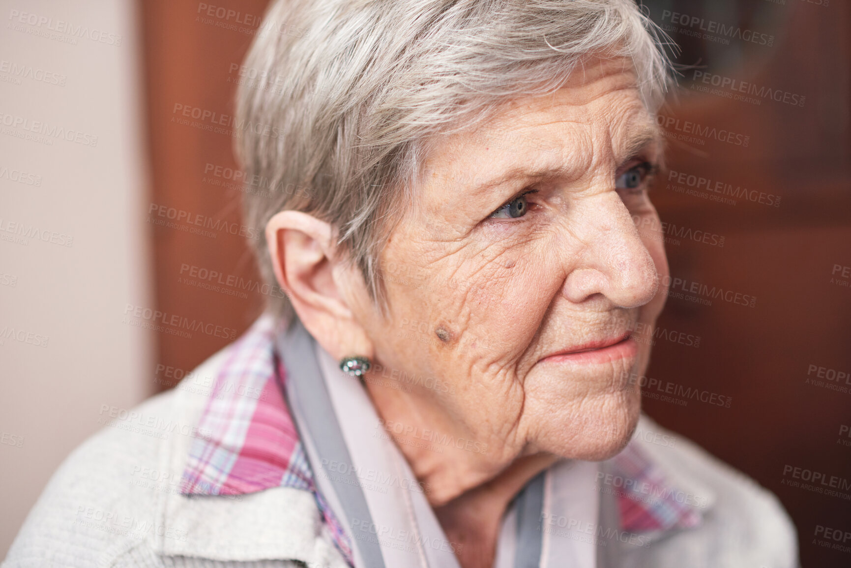 Buy stock photo Senior, woman and face or thinking on sofa with relax, peace and freedom in retirement or living room. Elderly, person and thoughtful on couch in lounge of home with confidence, dementia or alzheimer