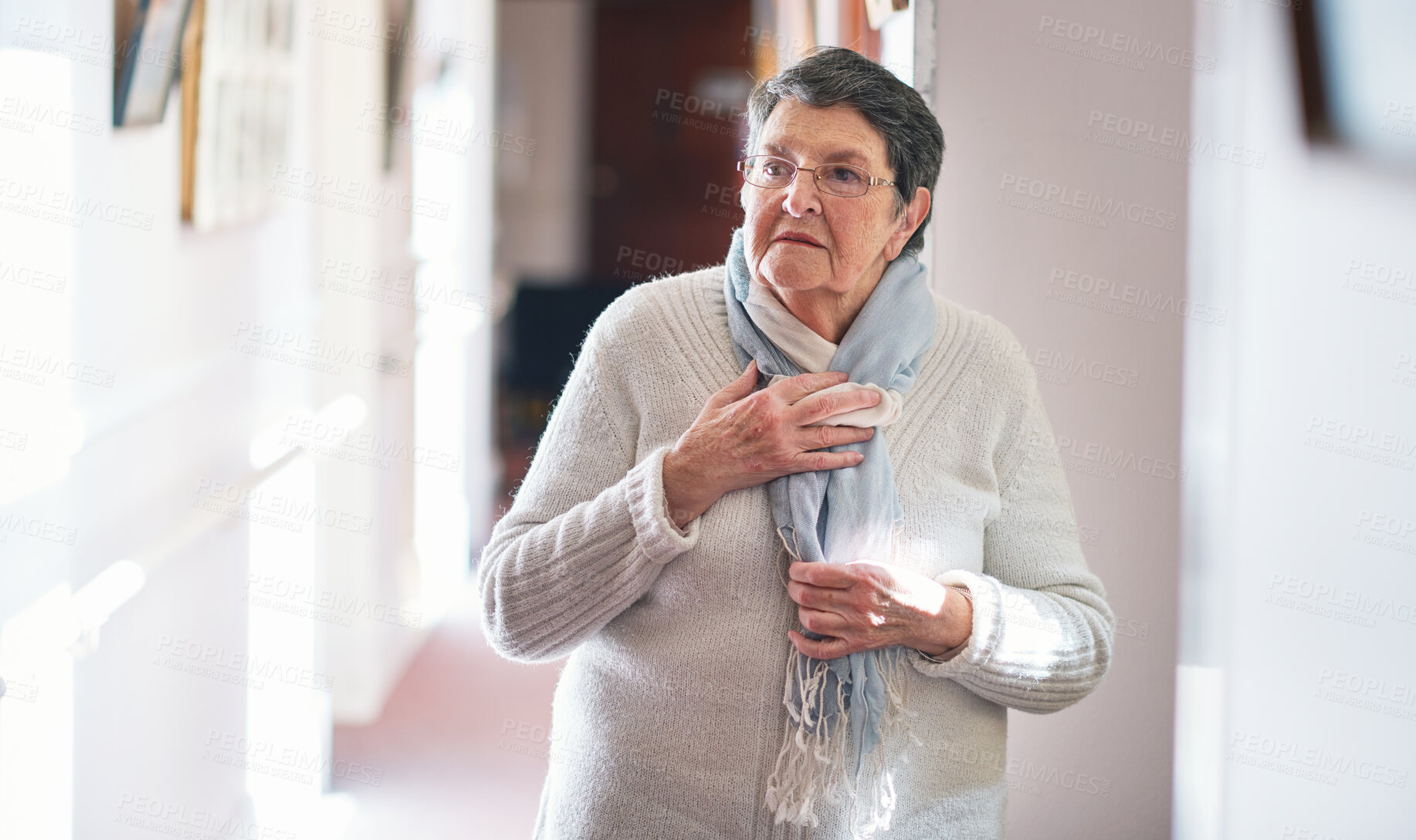 Buy stock photo Retirement, shock and senior woman in a house with anxiety, panic or fear in her home. Omg, surprise and old lady person in facility with hand on chest for unexpected wow, danger or scary disaster