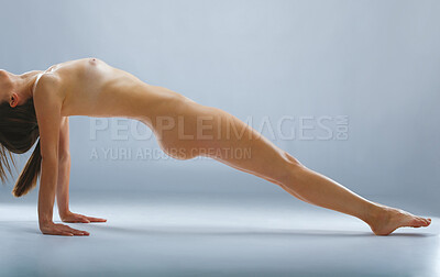 Buy stock photo Studio shot of a beautiful naked woman doing yoga