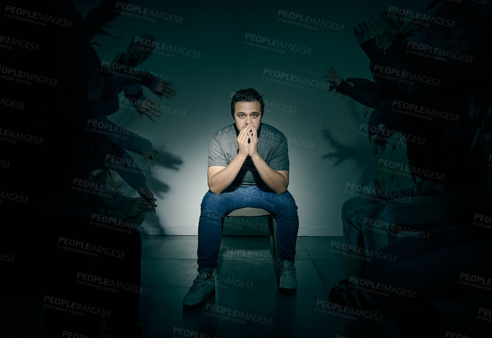 Buy stock photo One mixed race male suffering mental illness in asylum. Caucasian schizophrenic man experiencing a breakdown while being surrounded by people on a stage theatre performance