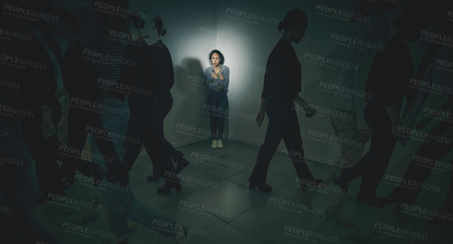 Buy stock photo One mixed race female suffering mental illness in asylum. Hispanic woman experiencing a panic attack while being surrounded by people inside. Rape and Abuse victim feeling alone